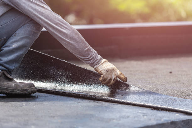 Professional Waterproofing technician working in Ferrysburg, MI